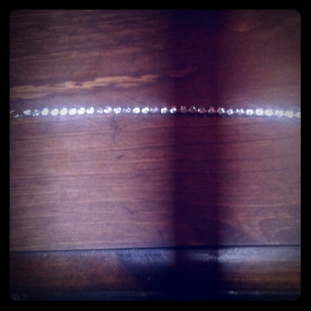 Diamond studded sterling silver tennis bracelet